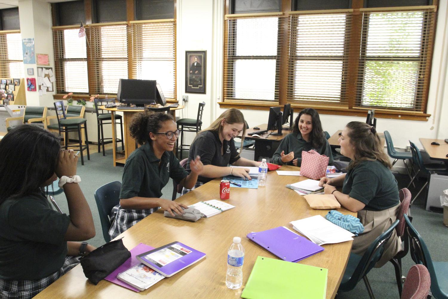 STUCO+members+use+the+library+during+5th+hour+to+plan+school+events+like+Veterans+Day+and+Eagle+Week.+