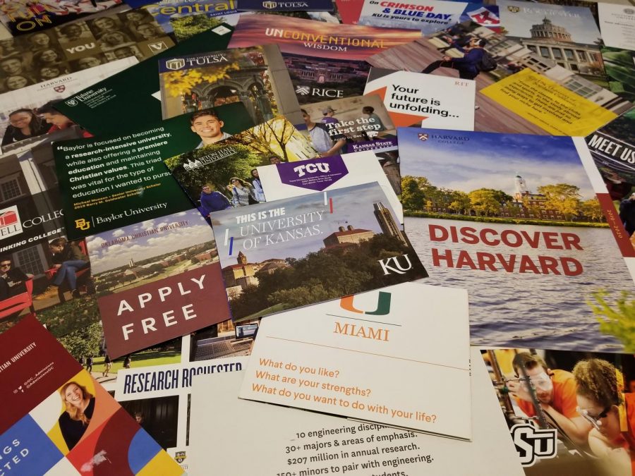 A+large+assortment+of+college+brochures+and+letters+from+various+different+colleges+and+universities.
